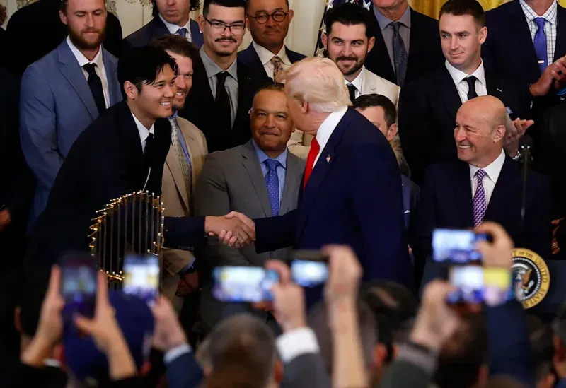 Donald Trump shakes hands with Shohei Ohtani at the Dodgers' White House ceremony